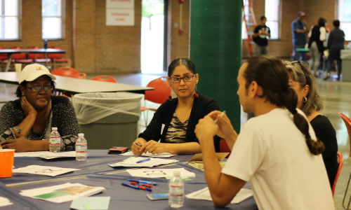 Community members around a table